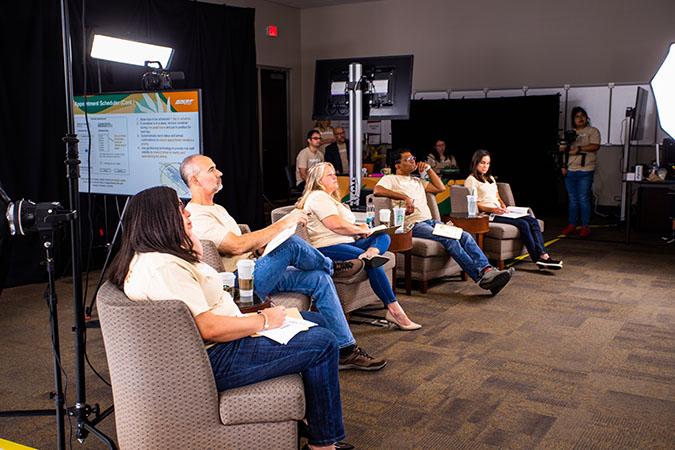 Judges Kalisha Holland, chief diversity & inclusion officer; David Smat, general director, Environmental Operations & Engineering; Christy Thomas, assistant vice president, Technology Services; Vipin Kohale, director, Technology Services; and Farah Lawler, vice president, Industrial Products, watch a team’s presentation.